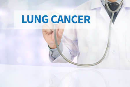 LUNG CANCER  Medicine doctor hand working on virtual screenの写真素材