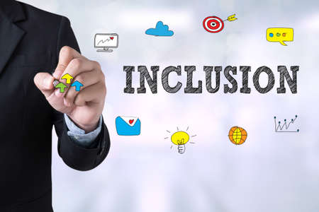 INCLUSION Businessman drawing Landing Page on blurred abstract backgroundの写真素材