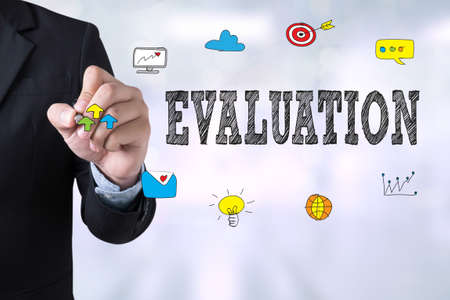 EVALUATION Businessman drawing Landing Page on blurred abstract backgroundの写真素材