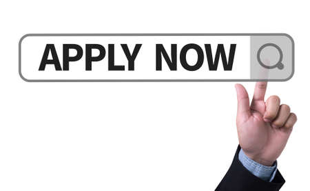 Apply Now man pushing (touching) virtual web browser address bar or search barの写真素材