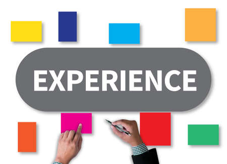 EXPERIENCE businessman work on white broad, top viewの写真素材