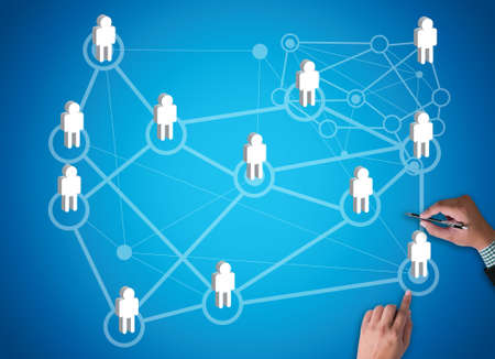 NETWORK (Network System Online Internet Web) businessman work on white broad, top viewの写真素材