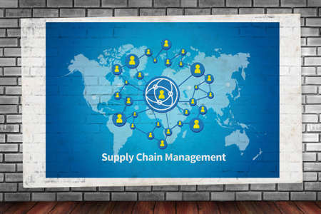 SCM Supply Chain Management concept  on brick wall and poster conceptの写真素材