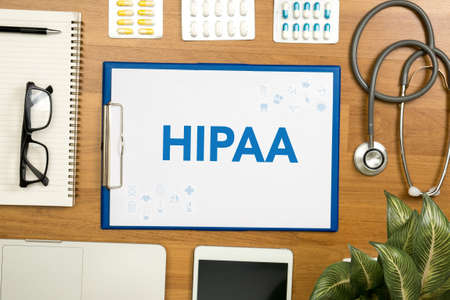 HIPAA Professional doctor use computer and medical equipment all around, desktop top viewの写真素材