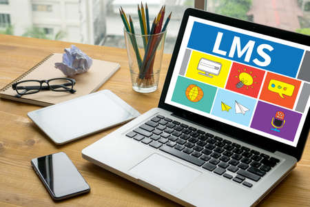 Learning Management System (LMS)  Laptop on table. Warm toneの写真素材