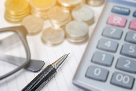 A finance Money, calculator notes, calculator top view with copy space workの写真素材