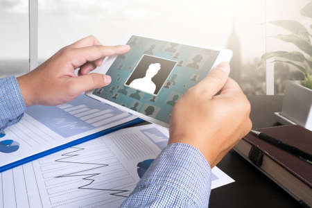 RESOURCES Human Resources Interview Recruitment Job  man using tablet computer, Marketing data paper3の写真素材