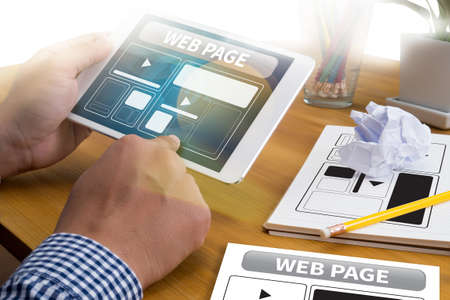 Web Design Template and  web page Closeup shot of laptop with digitaltablet and smartphone on desk....