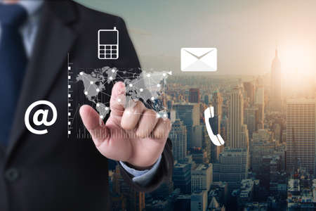 Business Digital businessman hand working on laptop computer and business strategyの写真素材