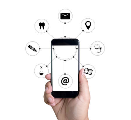 man hand holding smartphone device and  technology , businessman working with modern devices, digital tablet computer and mobile phone.の写真素材