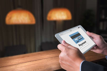 Man using mobile payments online shopping m-banking  Internet Global Marketingの写真素材