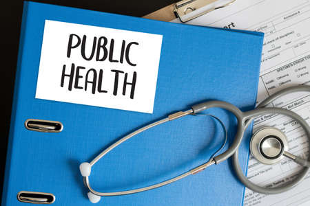 PUBLIC HEALTH  Professional doctor use computer and medical equipment all around, desktop top viewの写真素材