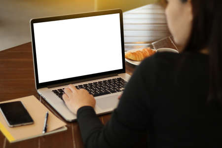Mockup Copyspace  Concept Female working on Computer Notebook Laptop in an outdoorの写真素材