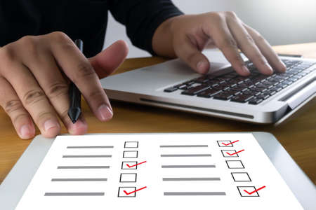 SURVEY and Results Analysis Discovery businessman giving online Conceptの写真素材