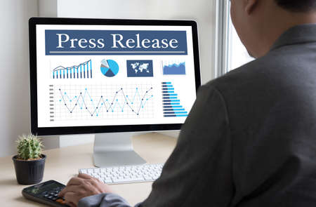 Press Release  concept, Thoughtful male person looking computerのeditorial素材