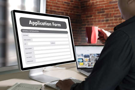 business man working on laptop computer use Online Web Job Application Form moniterの写真素材