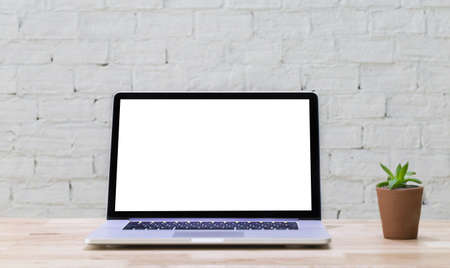 Workspace background new project on laptop computer with blank copy space screen for your advertising text message Laptop with blank screen on table.の写真素材