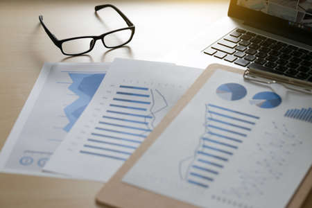 Checking financial reports paperwork and Business  Teamwork on table calculating or checking balanceの写真素材