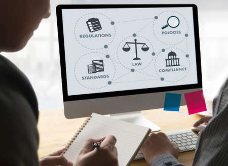 REGULATIONS and COMPLIANCE Rules Law professionals businessman working concept