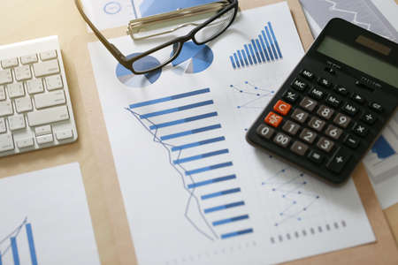 Checking financial reports paperwork and Business  Teamwork on table calculating or checking balanceの写真素材