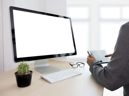 Young man working Businessman using a desktop computer of the blank screenの写真素材