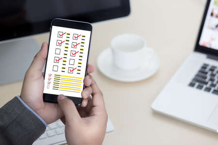 businessman SURVEY and Results Analysis Discovery Conceptの写真素材