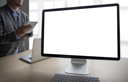 young man working Businessman using a desktop computer of the blank screen