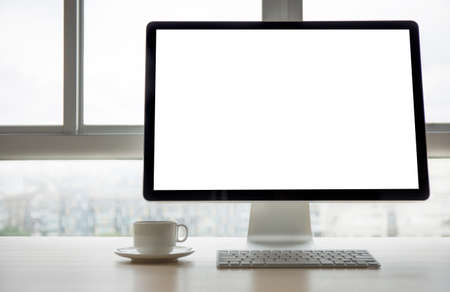 Workspace background new project on laptop computer with blank copy space screen for your advertising text message Laptop with blank screen on table.の写真素材