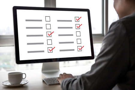 Businessman SURVEY and Results Analysis Discovery Conceptの写真素材