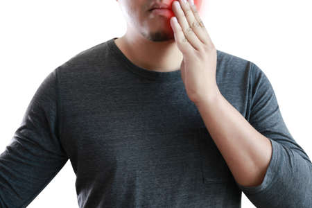 young man Feeling suffering  Lower back pain  Pain relief conceptの写真素材