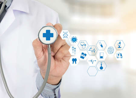 Medicine health care professional doctor  hand working with modern computer interface technologyの写真素材