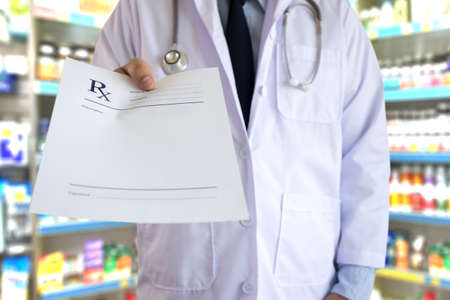 medicine doctor patient healthcare concept contraception Rx prescription form in drug store Pharmacist pharmacyの写真素材