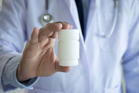 medicine doctor patient healthcare concept contraception Rx prescription form in drug store Pharmacist pharmacyの写真素材