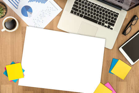 Top view man used of laptop  hands on a wooden desktop and copy spaceの写真素材