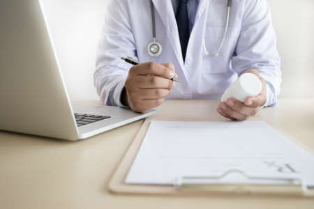 medicine doctor patient healthcare concept contraception Rx prescription form in drug store Pharmacist pharmacyの写真素材