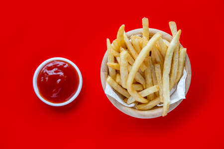 Tasty french fries, fast food products with ketchupの写真素材