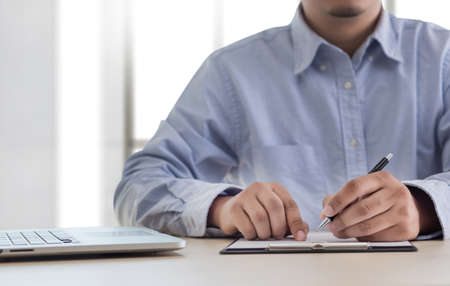 Businessman working reading documents graph financial to job succes Analyze document plans