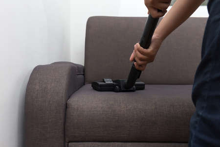 Cleaning Service man cleaning  floor with machine on Carpet to workの写真素材