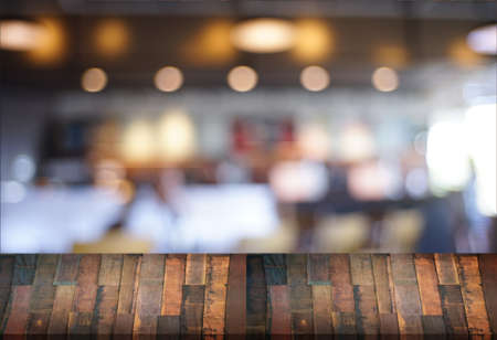 Empty wooden table blurred background selective focus