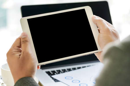 Workspace background new project on laptop computer with blank copy space screen for your advertising text message Laptop with blank screen on table.の写真素材