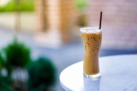 Iced coffee in coffee shop and  iced espresso  on old wooden tableの写真素材