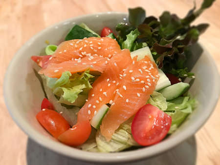 healthy salmon salad with lemon dressingの写真素材