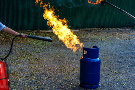 fire safety tank in the factory Practice a fire drill outdoor Many working people training
