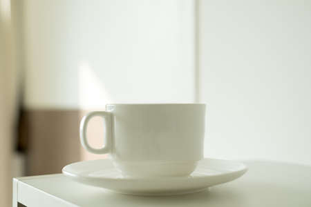 morning Hot  coffee in  Cup of coffee on window sill room