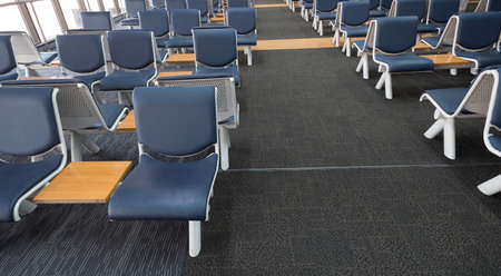 Empty airport terminal waiting area with chairs lounge with seats in the airport