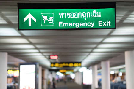 Emergency Exit in the building Green exit signの写真素材