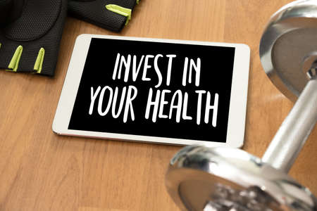 Invest in your health Healthy lifestyle concept with diet and fitness healthy foodの写真素材