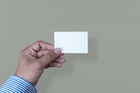 Hand hold blank white card mockup Business branding.の写真素材