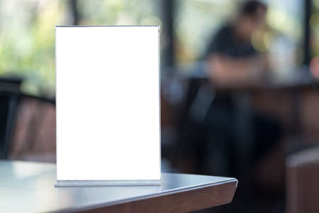 Mock up stand menu frame with white card and blurred backgroundの写真素材