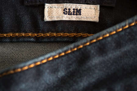 Closeup of Denim texture of denim Jeans and stitch for vintage